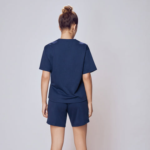 Person wearing a navy blue Co-ord Set for Women on a plain background