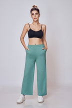 Women wearing Lango Cosy Flared Track Pants casual yoga wear